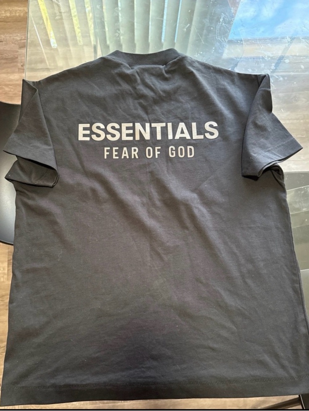 Fear of God ESSENTIALS Black Tee with White Back Logo